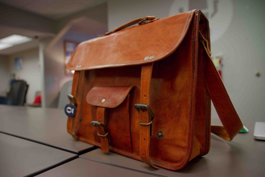 Leather briefcases for men have long been synonymous with professionalism and style. (Photo: Unsplash)